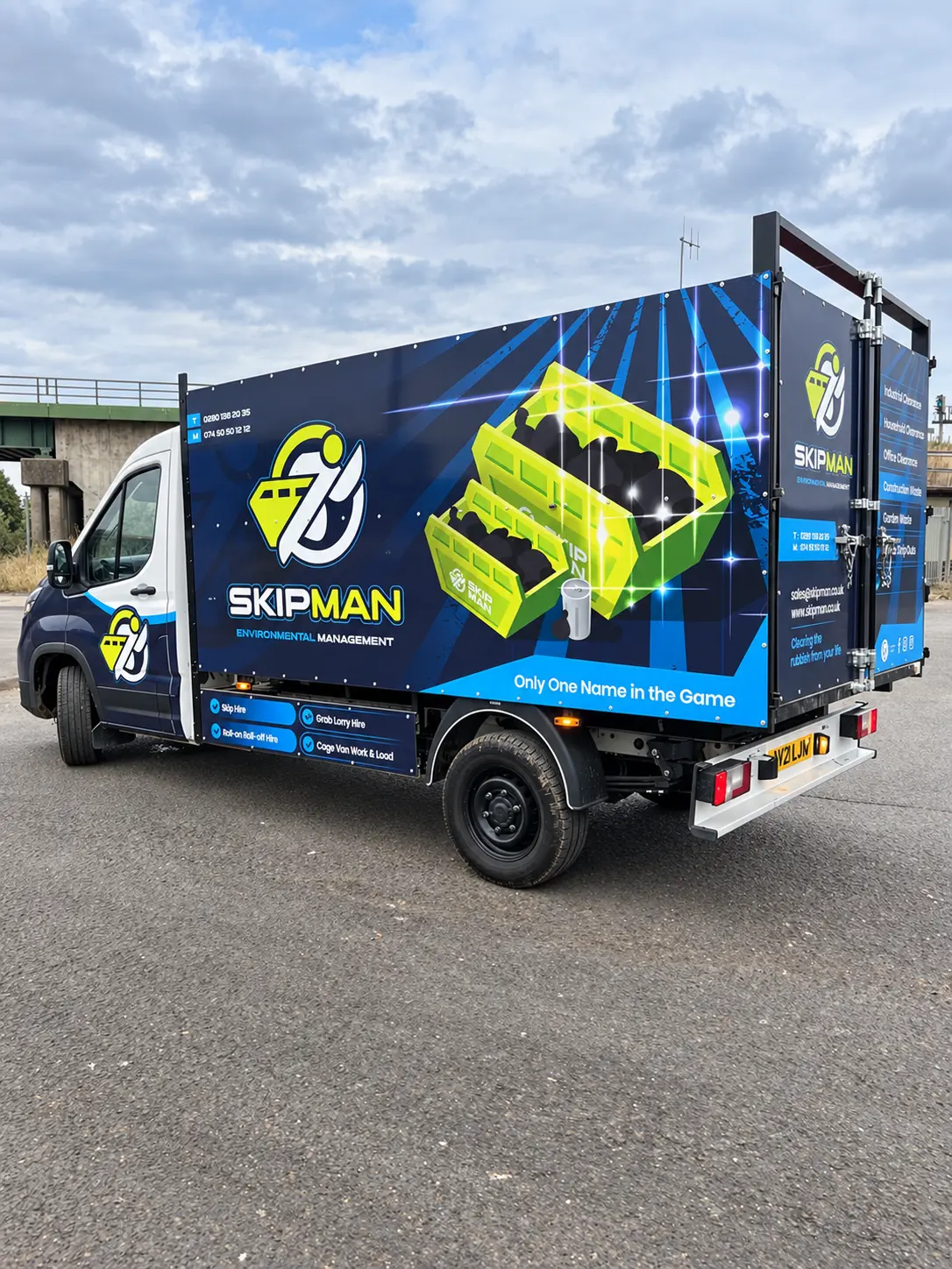SKIPMAN cage van ready at an industrial site
