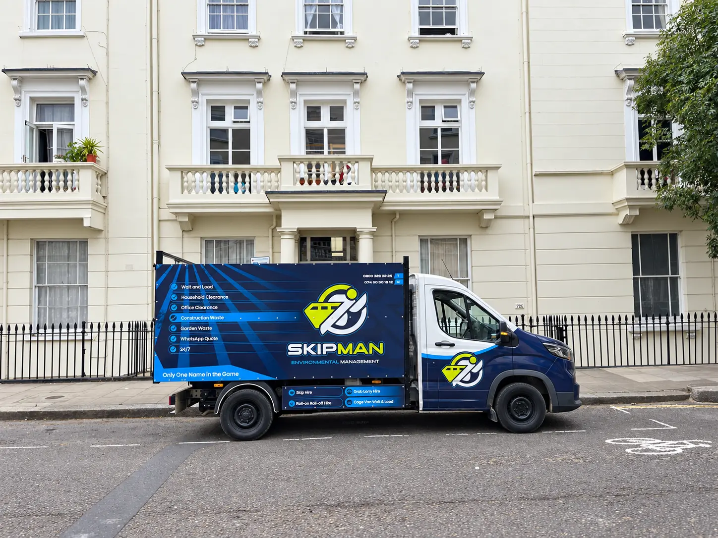 SKIPMAN cage van parked during a London rubbish collection